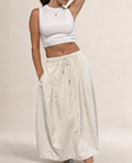 Angled studio view of Pretty Hours lightweight khaki drawstring midi skirt